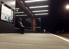 Crossdresser exposing at tram station