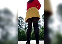 Crossdresser in my nylon hose tights leotard and miniskirt walking around the neighborhood enjoying the traffic going by.