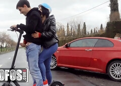 Megan Fiore jerks off Jordi ENP while riding an electric scooter down an empty road