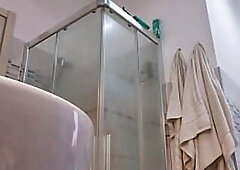 Concupiscent blond shows her boobs in the washroom stall