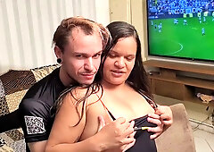 Curvy Latina with prominent buttocks enjoys oral from a man while another watches