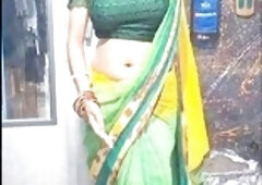 Indian couple gets hot watching porn and goes at it with some raunchy action in Hindi