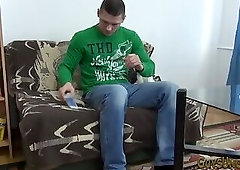 Hunky uncut stud strokes his dick