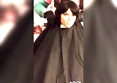 Nikki models 5 capes used during haircutting and shaving services that babe looks quite hawt