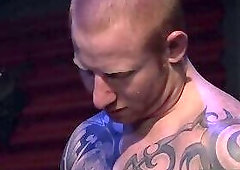 Mild bondage scene of two sexy gay dudes