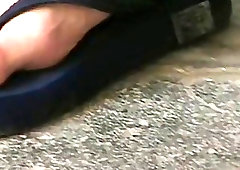 Sporty dude works out before teasing with his bare feet