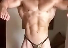 Guy In Gold Posing Trunks Flexing and Posing