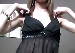 Alluring brunette TS cutie strips into panties and eats cock