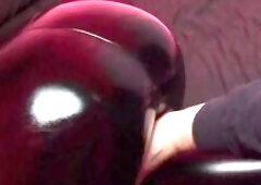 Oily leather leggings booty drubbing with paddle