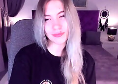 Blonde teen smoking and stripping off