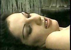 Bondage act with a tranny and chap in mask