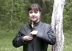 Lewd plump MILF exposes her tits and gets ready to pee outdoors