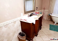 Blonde milf Skylar Snow gives stepson an intense POV blowjob in the bathtub
