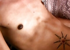 Slim Asian ladyboy with tattoos Rhiane jacks off and cums