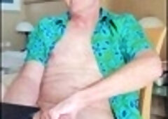 Guy in glasses strokes cock on a cruise ship