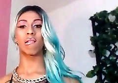 Ebony dyke jerks off the monster dick on cam