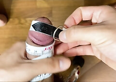 A Asian guy measures the size of a lollipop!