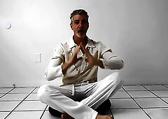 Silver fox Richard Lennox shows off his feet during a yoga session
