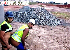Public workers having bang-out on the construction website.