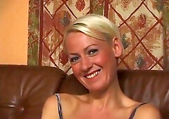 Large titted golden-haired babe rubs and fingers her vagina at the casting.