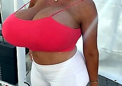 Blonde is flashing her big boobs in the outdoors