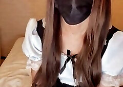 Masked crossdresser masturbates to live stream video