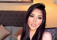 black hair tgirl in Leopard print underwear strip teasing on webcam