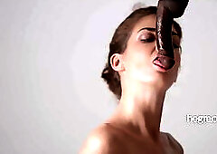 Lovely lady is sucking a hard dick through a gloryhole and listening to her lover's moans