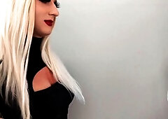 Crossdresser Bailey Wilde and a woman applying lipliner and lipstick together