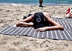 youthful woman gets banged on the beach by a stranger banging from behind