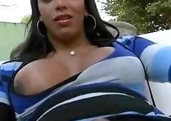 Big breasted latina shemale Kamily gets blacked in the backyard
