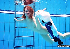 Teen babe Avenna is swimming in the pool