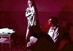 Behind the scenes of an early 1970s hardcore episode. Short and coarse.