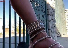 Milka Porkova in red dress teases Eric John with her legs and feet outdoors before he cums on her skin